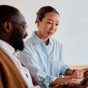 Man and woman looking at accounts